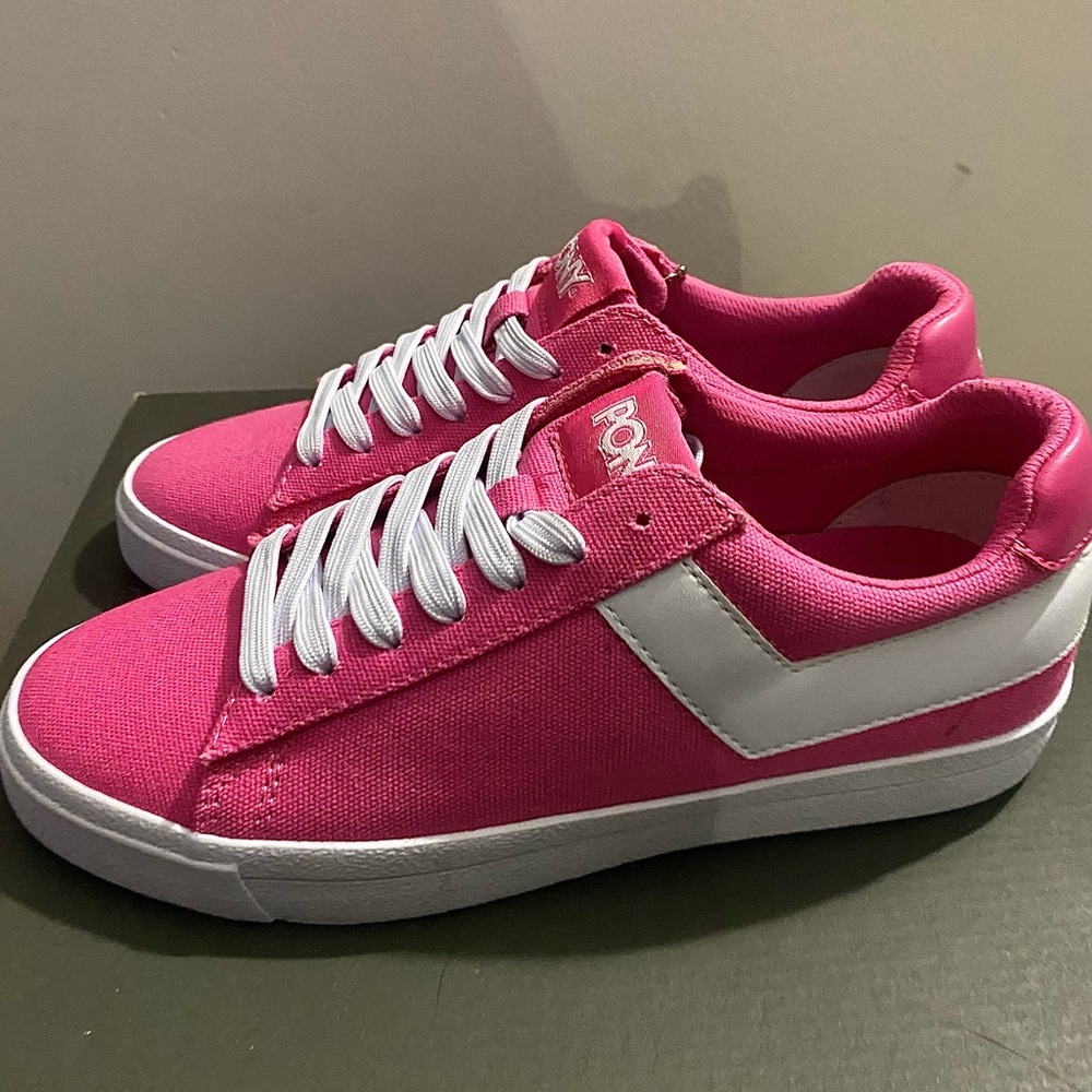pink pony sneakers with white accents